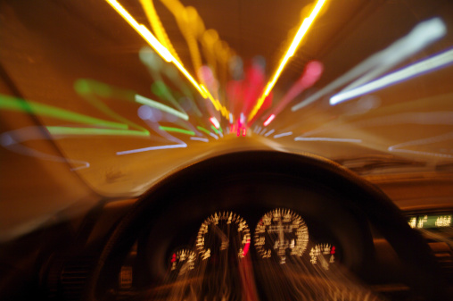 Viewpoint from the driver's seat of a speeder. Motion blur shows the high rate of speed the vehicle is going.